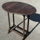 Small folding table called Gateleg, Victorian era
