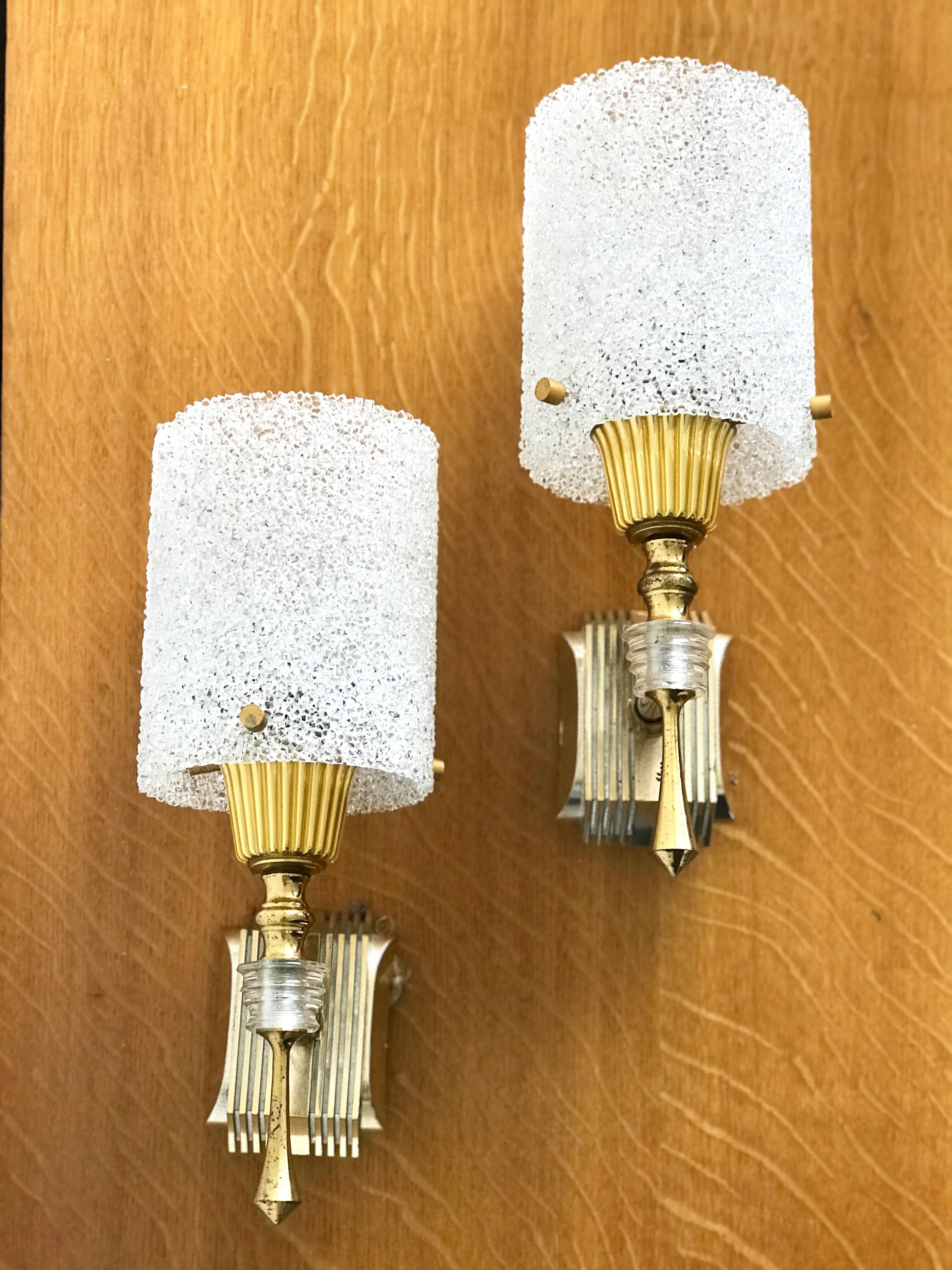 Pair of sconces in gold metal and plexi granita