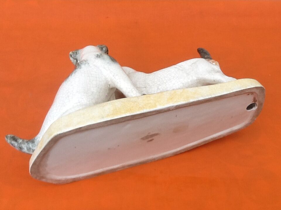 Zoomorphic sculpture cracked ceramic fox terrier dogs