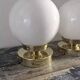 Paire d’appliques globes en opaline blanche
