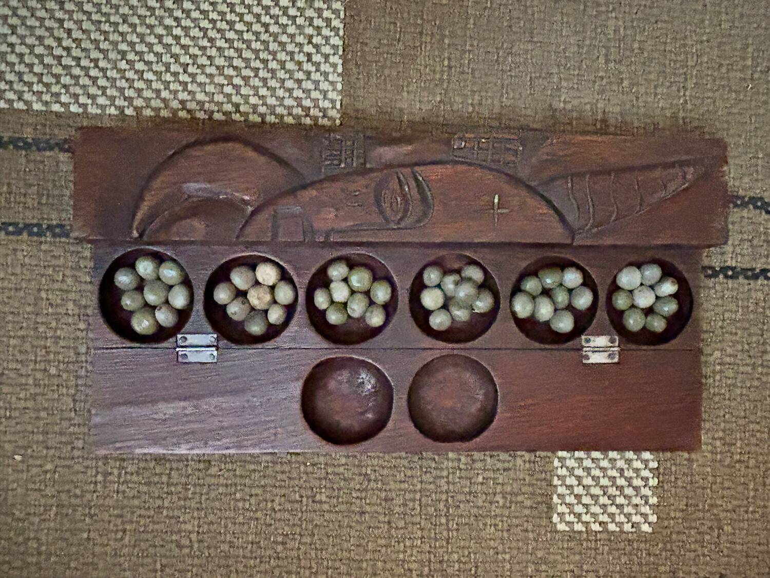 Awalé game in carved wood