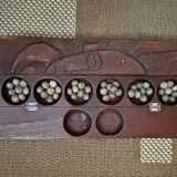 Jeu d’Awalé en bois sculpté