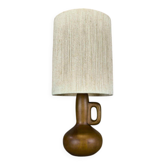 Vintage wooden table lamp with a wool shade.
