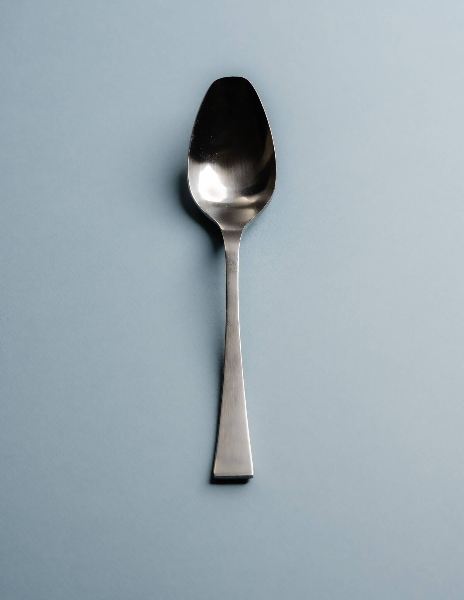 GUY DEGRENNE STAINLESS STEEL CUTLERY SET, 1970s