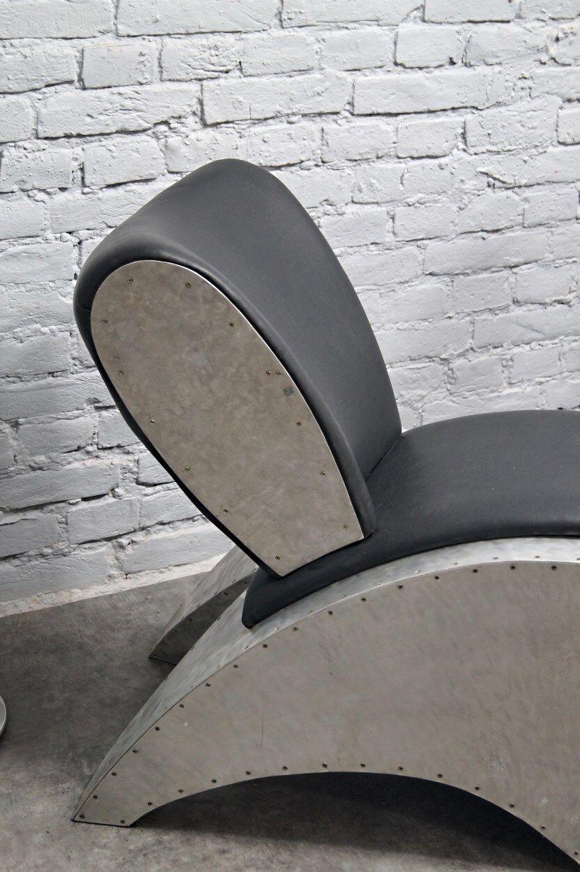 Industrial aluminum & vinyl lounge chair with footrest, 1970s
