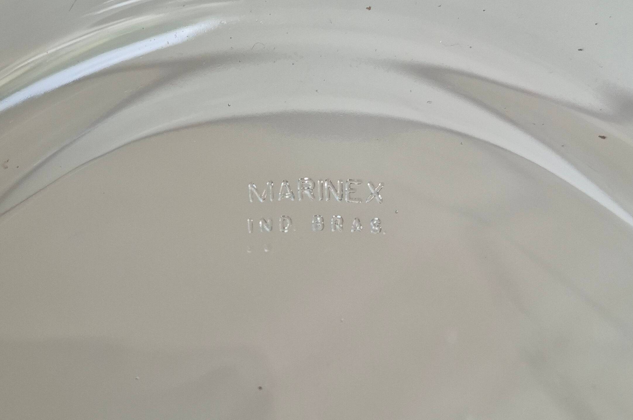 Oval Pyrex gratin dish, silver-plated metal stand.