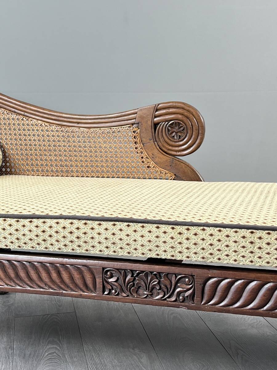 Louis XVI style meridian in carved wood and caning, 19th century.