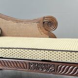 Louis XVI style meridian in carved wood and caning, 19th century.