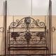 Venetian bed in iron and cast iron from the Art Nouveau period with polychrome decorations