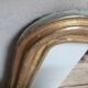 Golden Louis Philippe mirror H122xW84cm with gilded motifs.