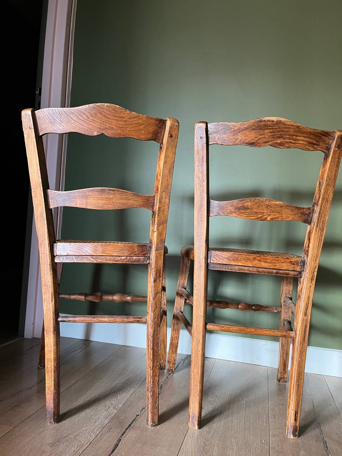Pair of vintage chairs from the late 20th century with caning.