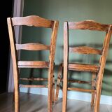 Pair of vintage chairs from the late 20th century with caning.