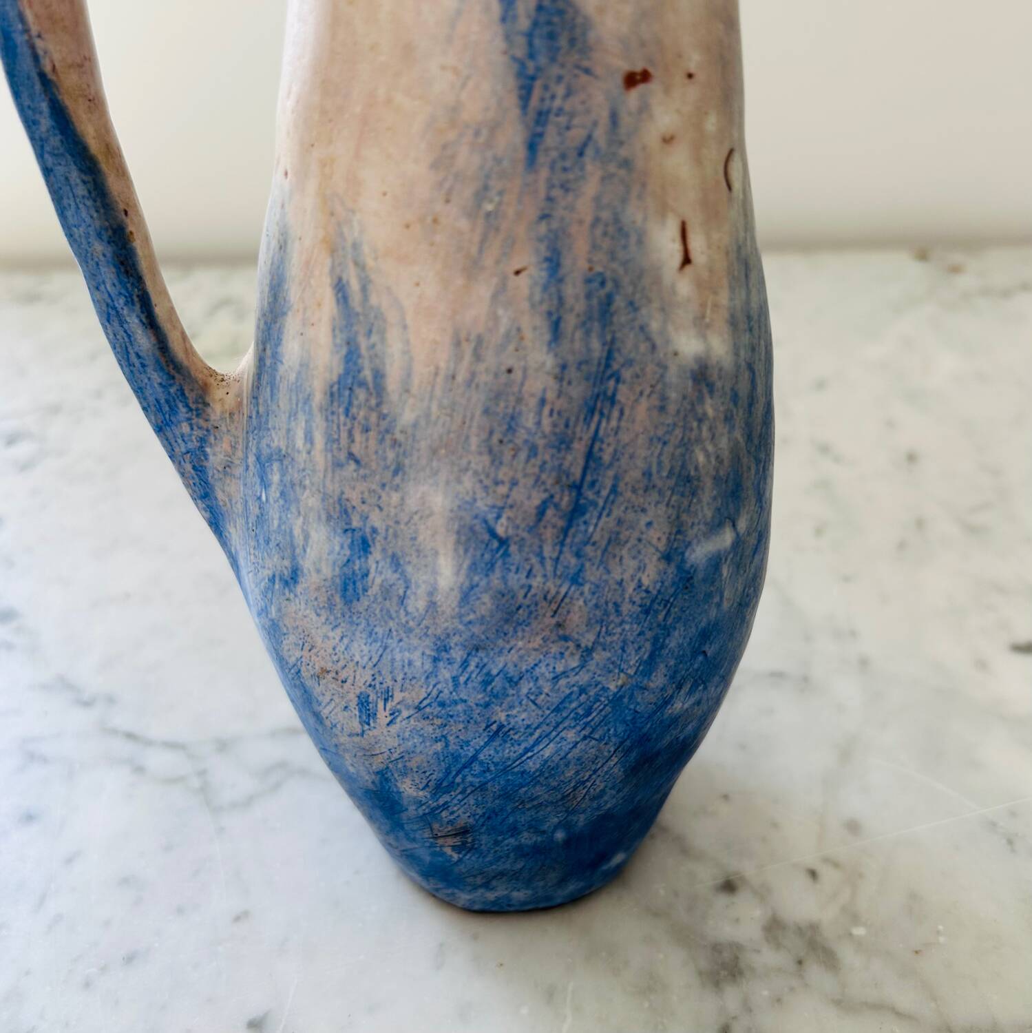 Set of artisanal pitcher and weathered cups