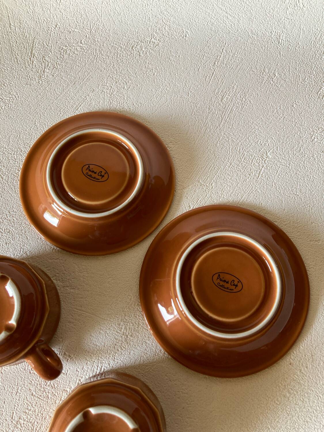 Caramel-colored bistro coffee cups and saucers