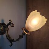 Bronze wall light with opaque glass tulip 1900