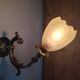 Bronze wall light with opaque glass tulip 1900