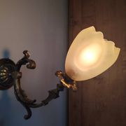 Bronze wall light with opaque glass tulip 1900