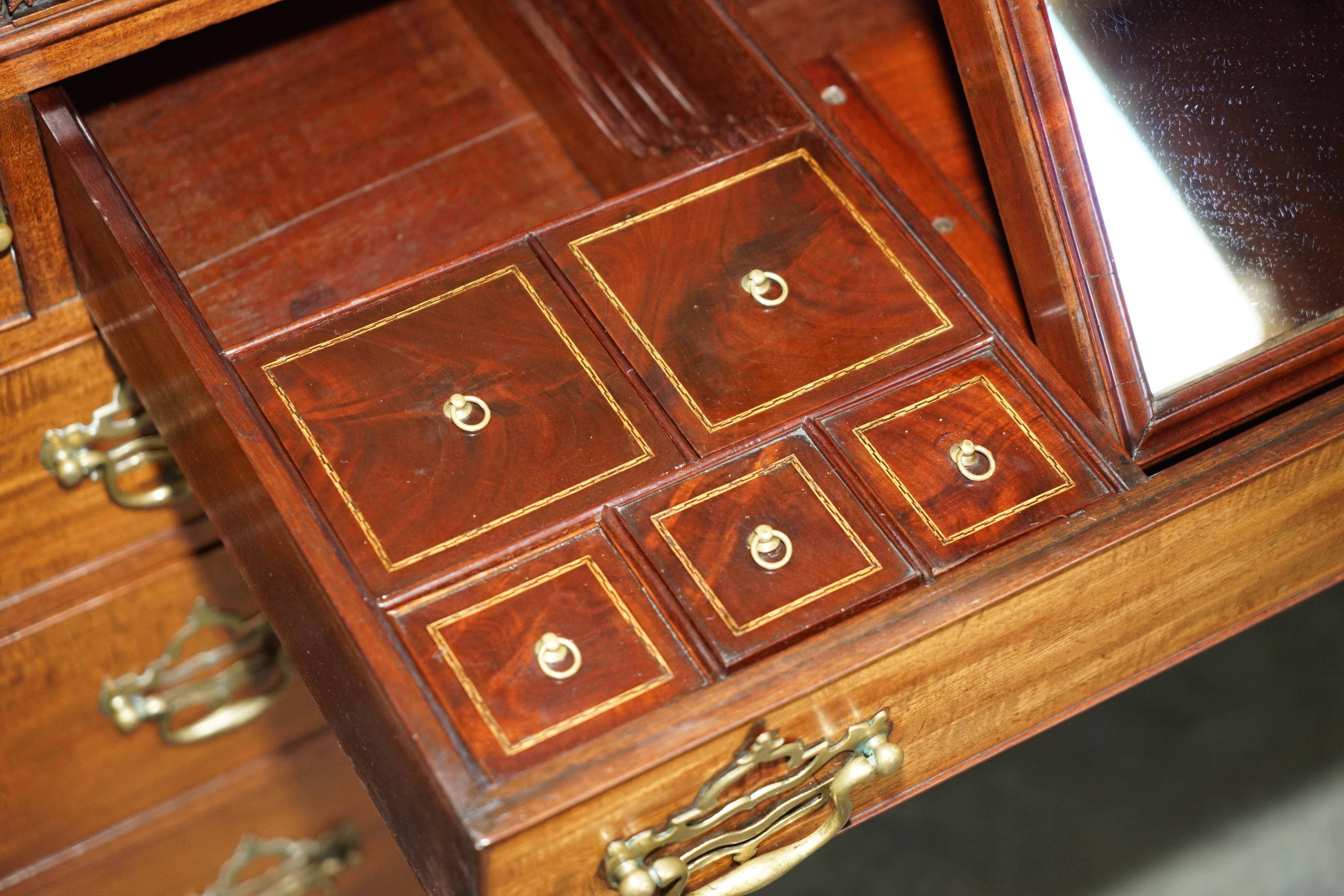 George III commode circa 1770 in walnut by Thomas Chippendale.
