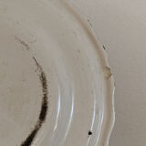 Signed Moustiers plate, in yellow shades