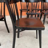 Set of 18 curved wooden bistro chairs with patina from the 60s