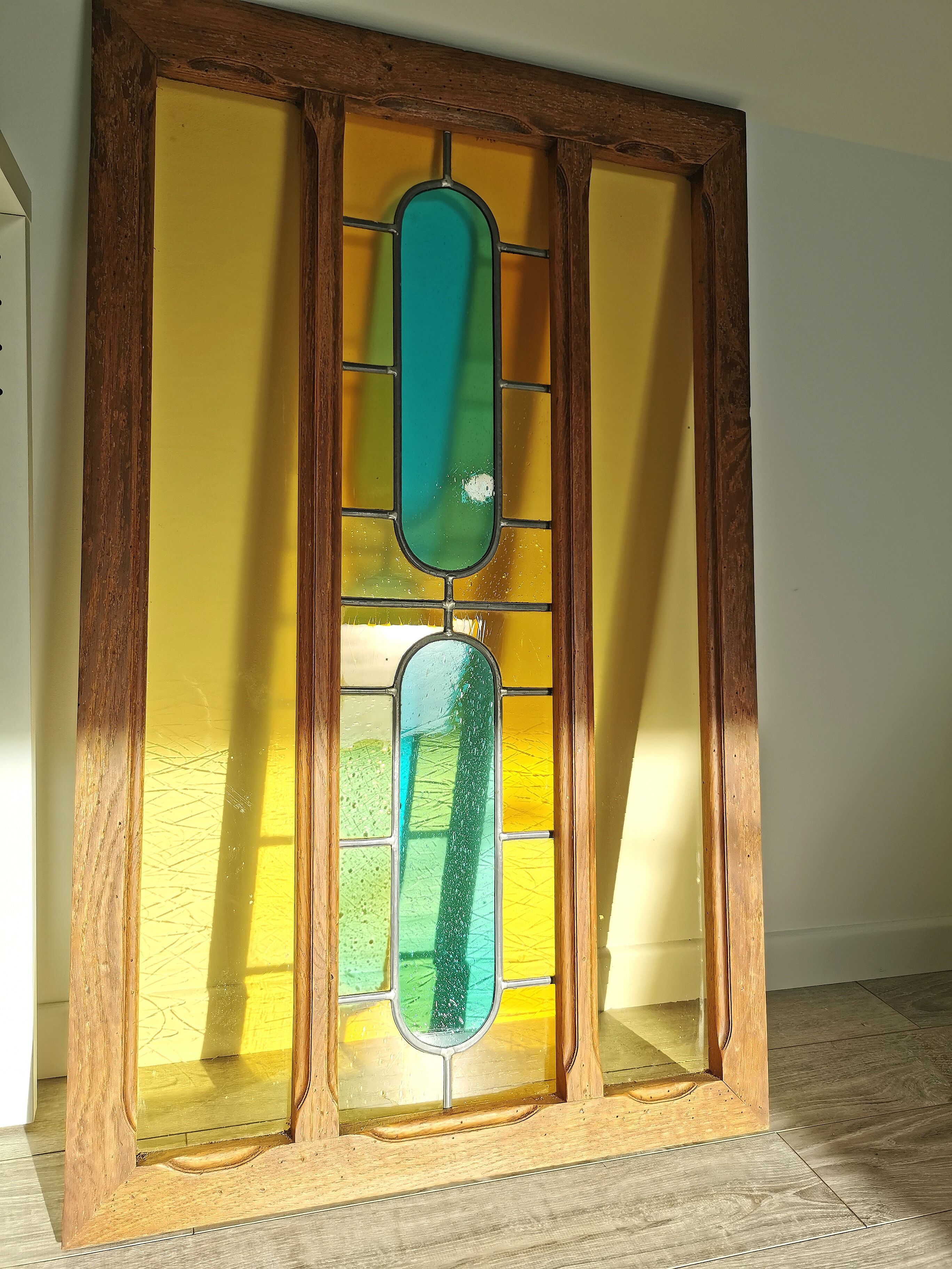 Stained glass window with framing