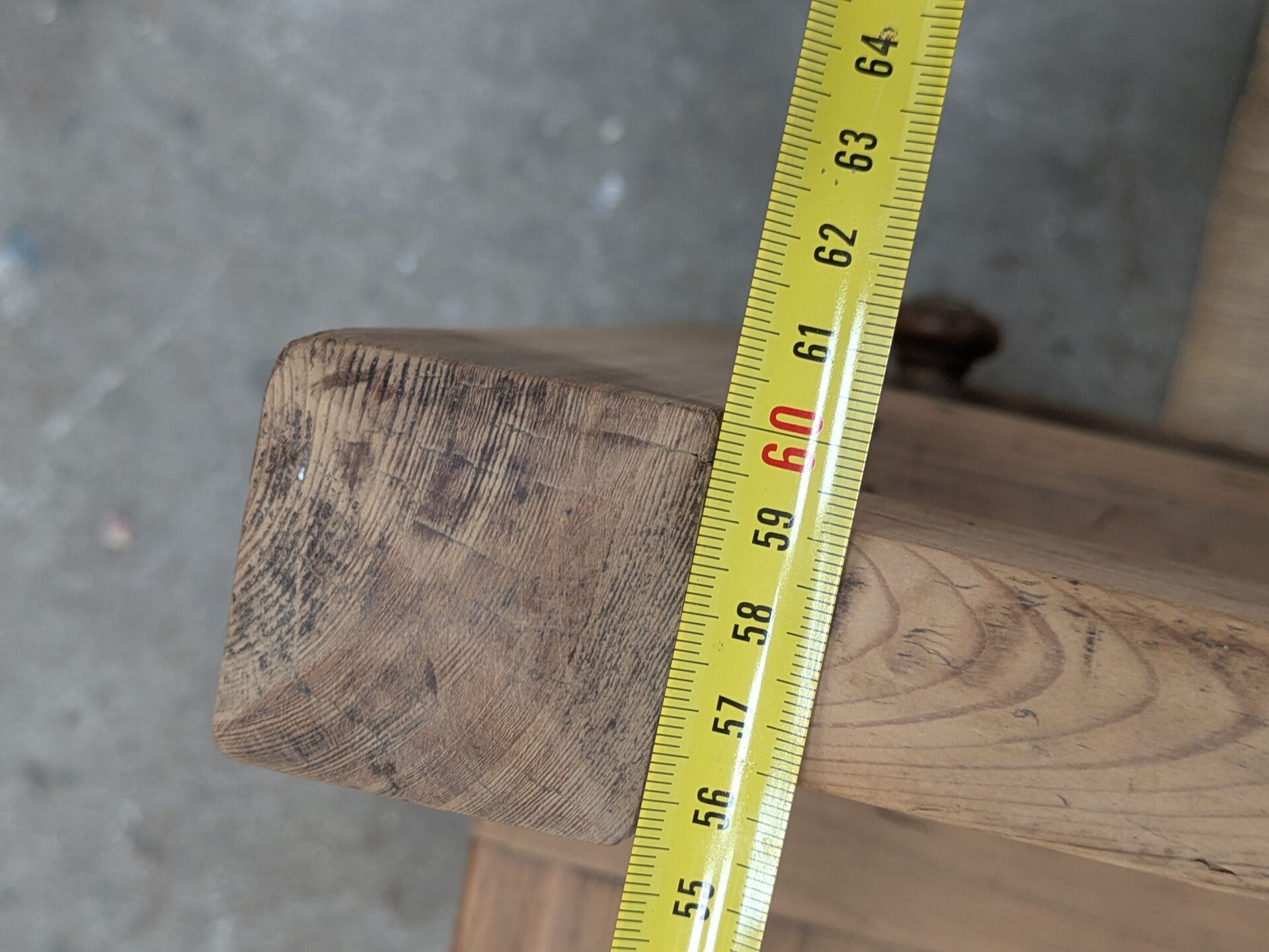 Antique armchair in raw wood
