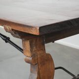Antique 18th-century Spanish dining table with a wrought iron base