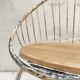 Basket armchair in metal and wood.
