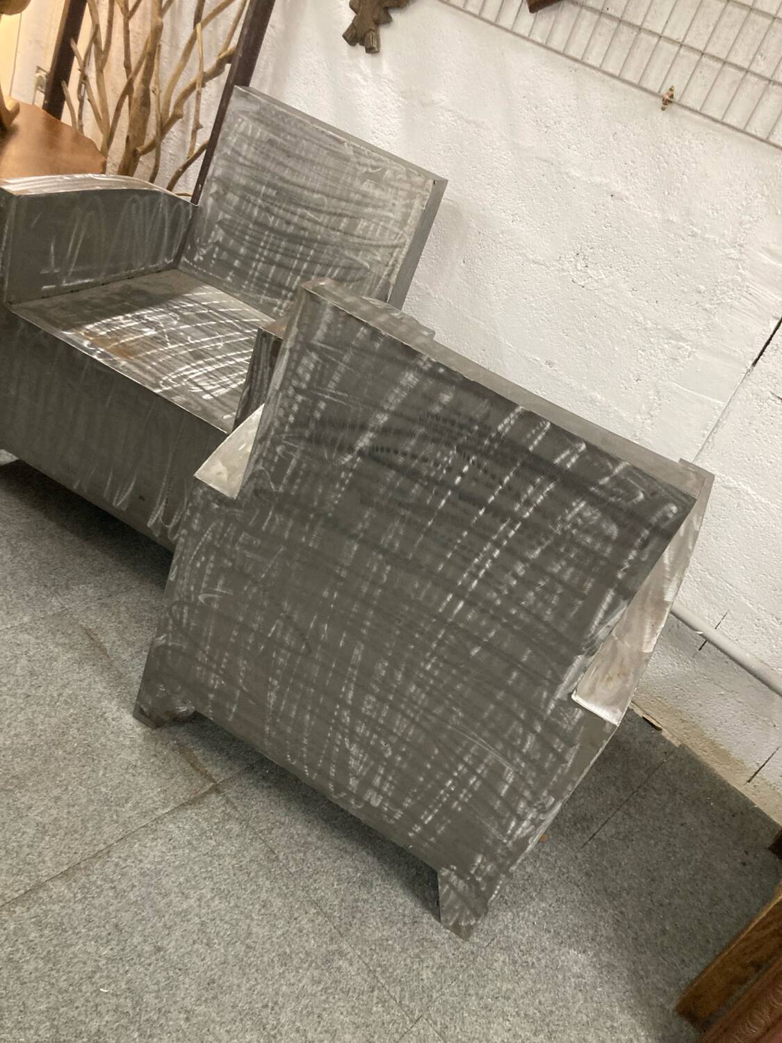Pair of industrial metal armchairs