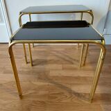 Vintage 1970 gold metal nesting tables.