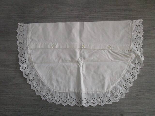 Antique embroidered half-moon crib pillowcase