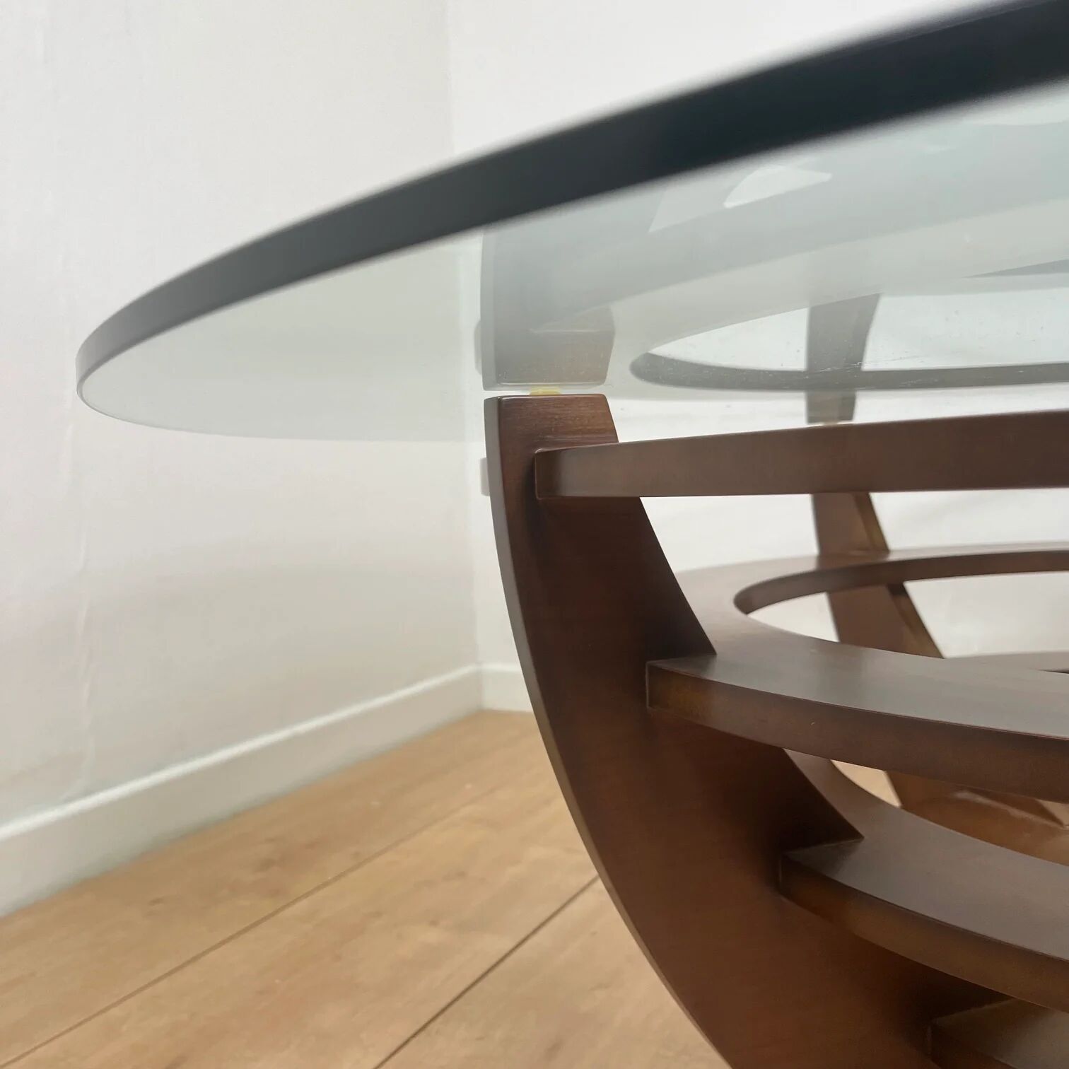 Sculptural coffee table with concentric rings, glass and wood, circa 1985.