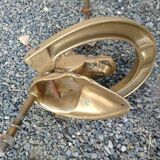 Horse head on horseshoe door knocker