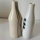 Duo de vases en céramique émaillée, décor pictural, signés MU