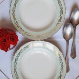Old hollow plates mismatched in earthenware with gilded edges