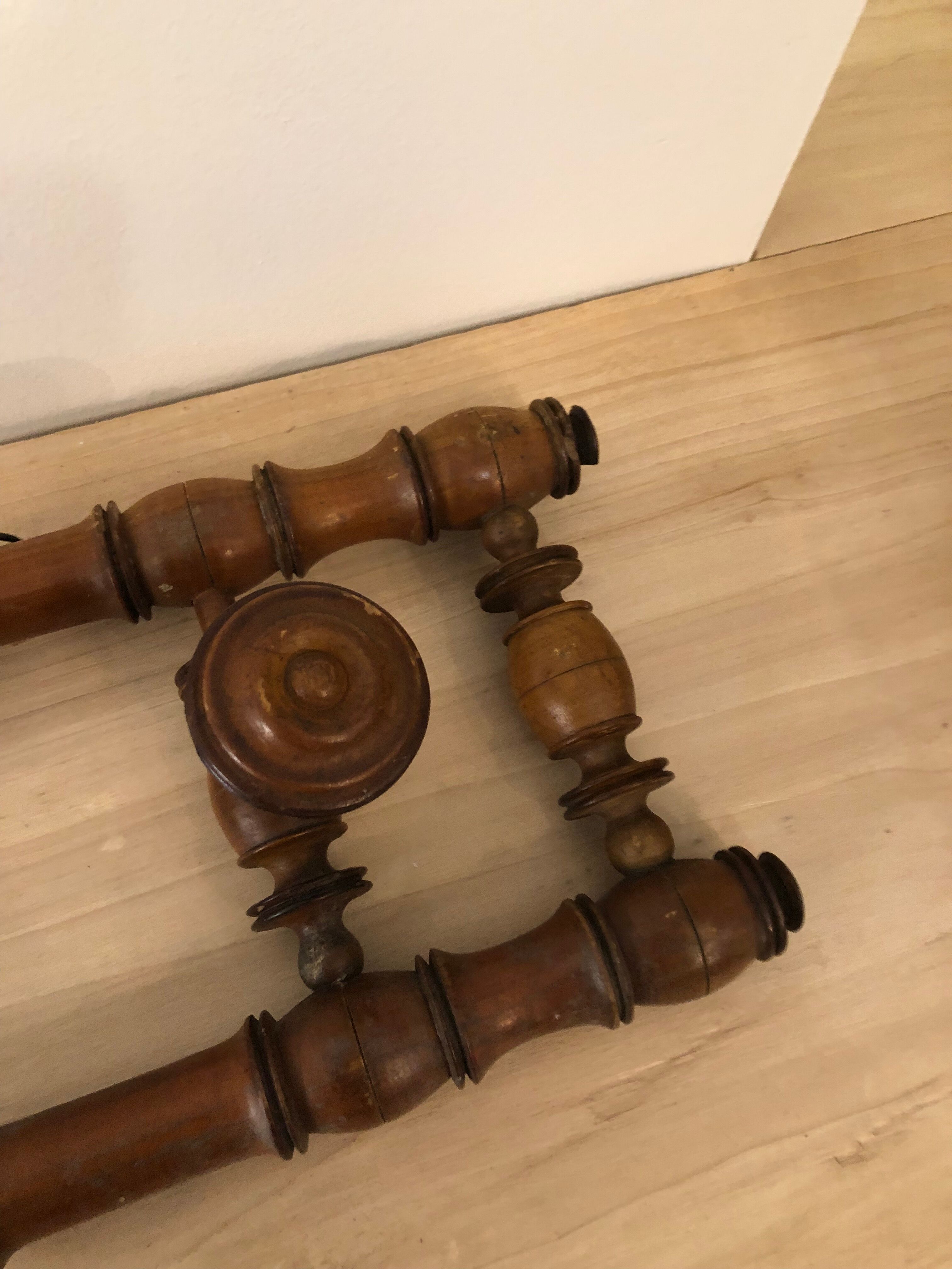 Wooden coat rack with swivel hooks