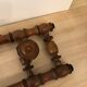Wooden coat rack with swivel hooks