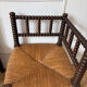 Pair of rush-seated chairs by the fireside "bobbin"
