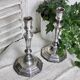 Pair of silver-plated bronze candlesticks