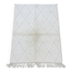 Small Moroccan rug with small white diamonds.
