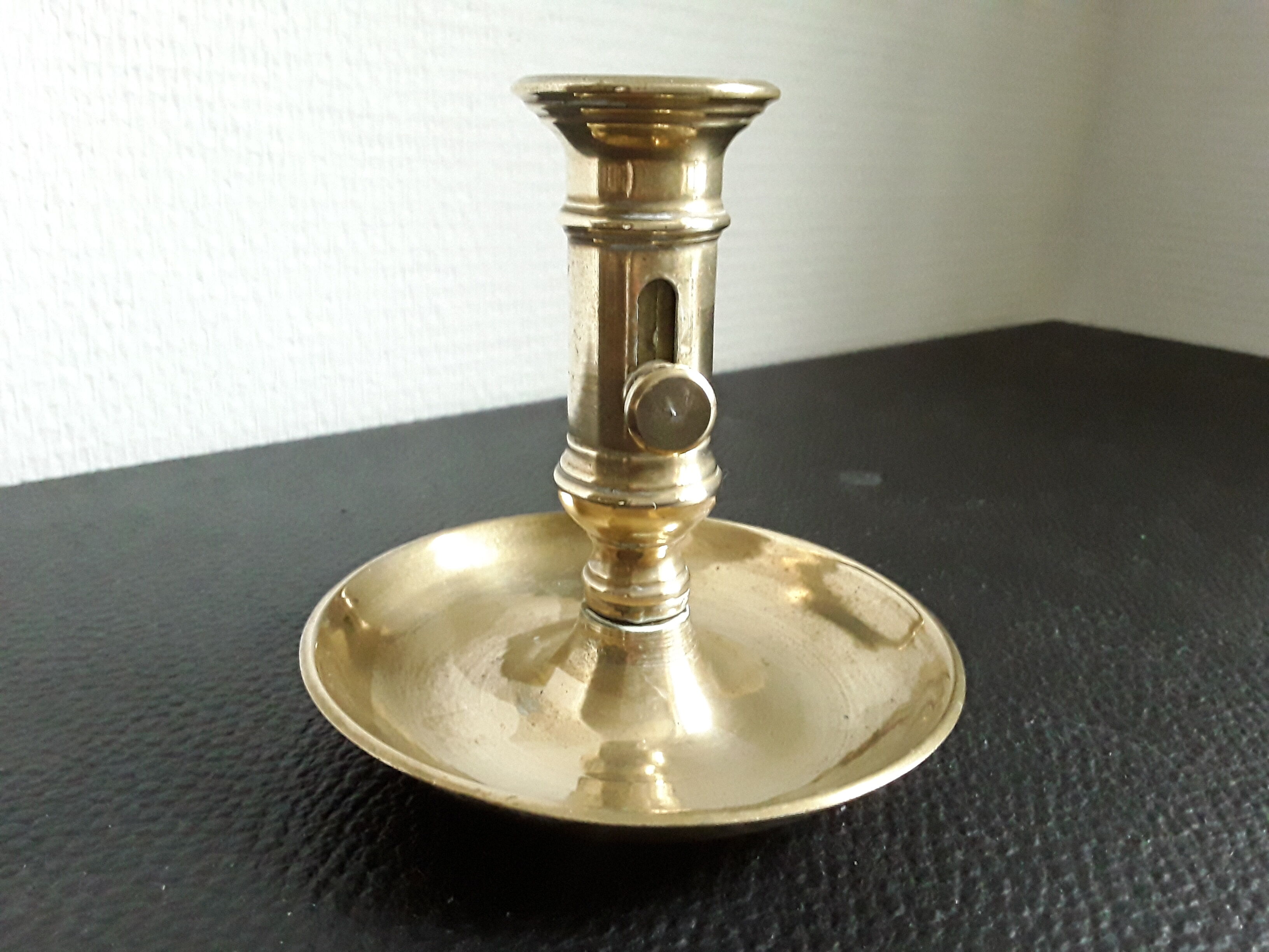 Candle holder with vintage brass handle