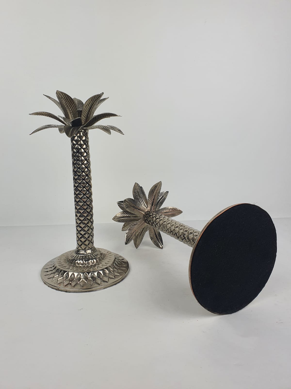 Pair of Palmtree design candle holders