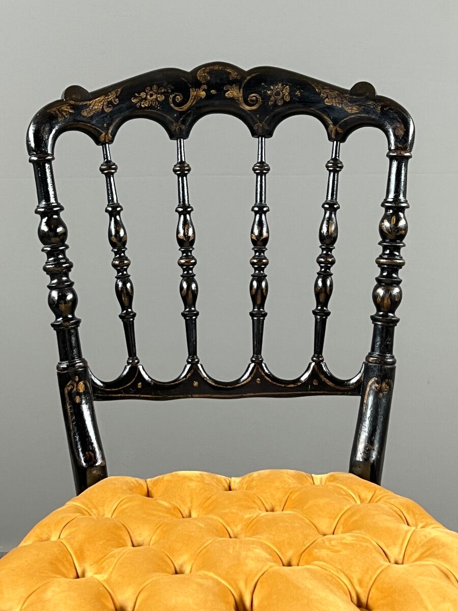 Set of four Napoleon III chairs in blackened wood, 19th century.