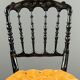 Set of four Napoleon III chairs in blackened wood, 19th century.