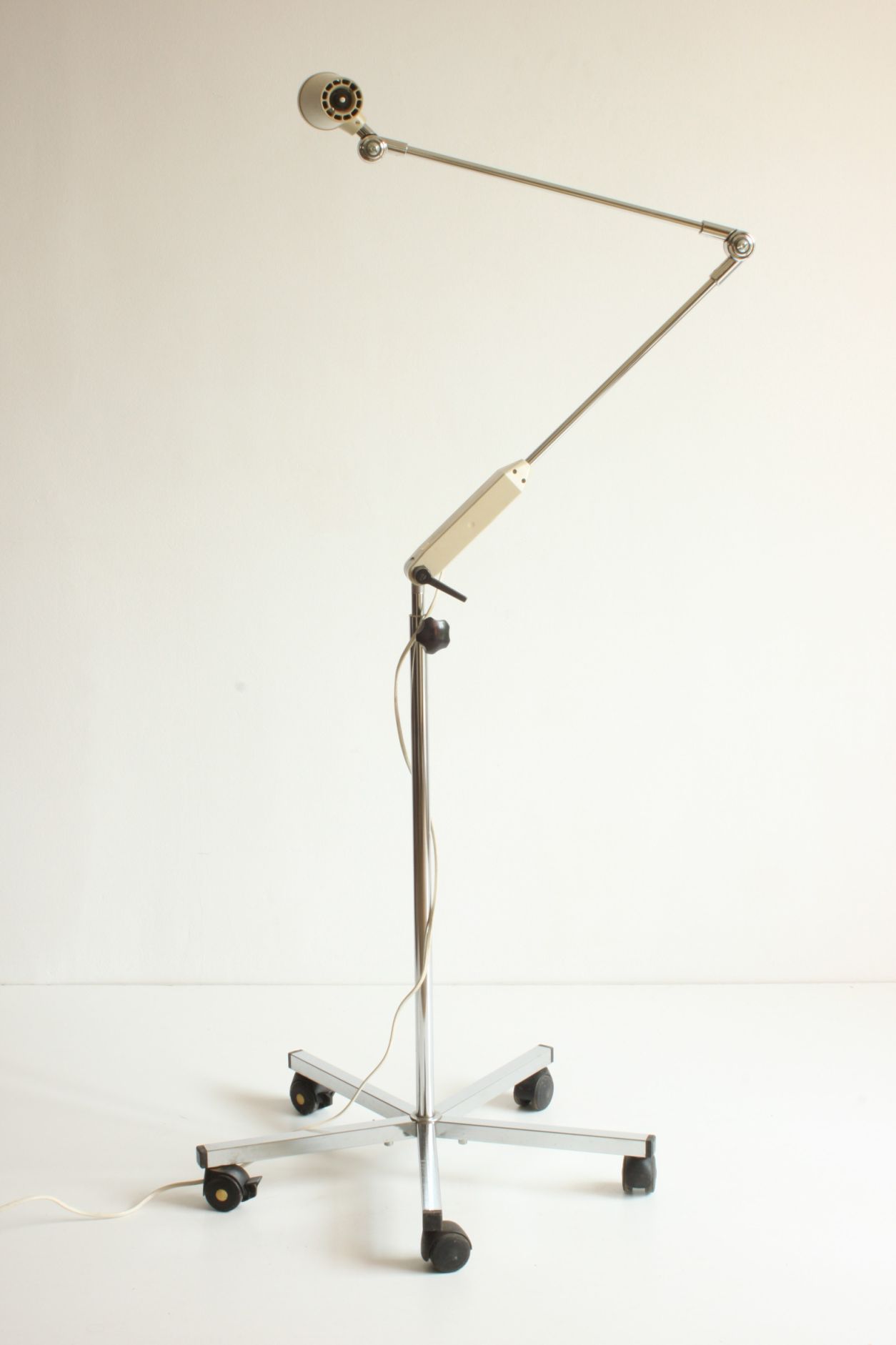 Vintage adjustable chrome medical precision light by Derungs Licht, Switzerland 1980s.