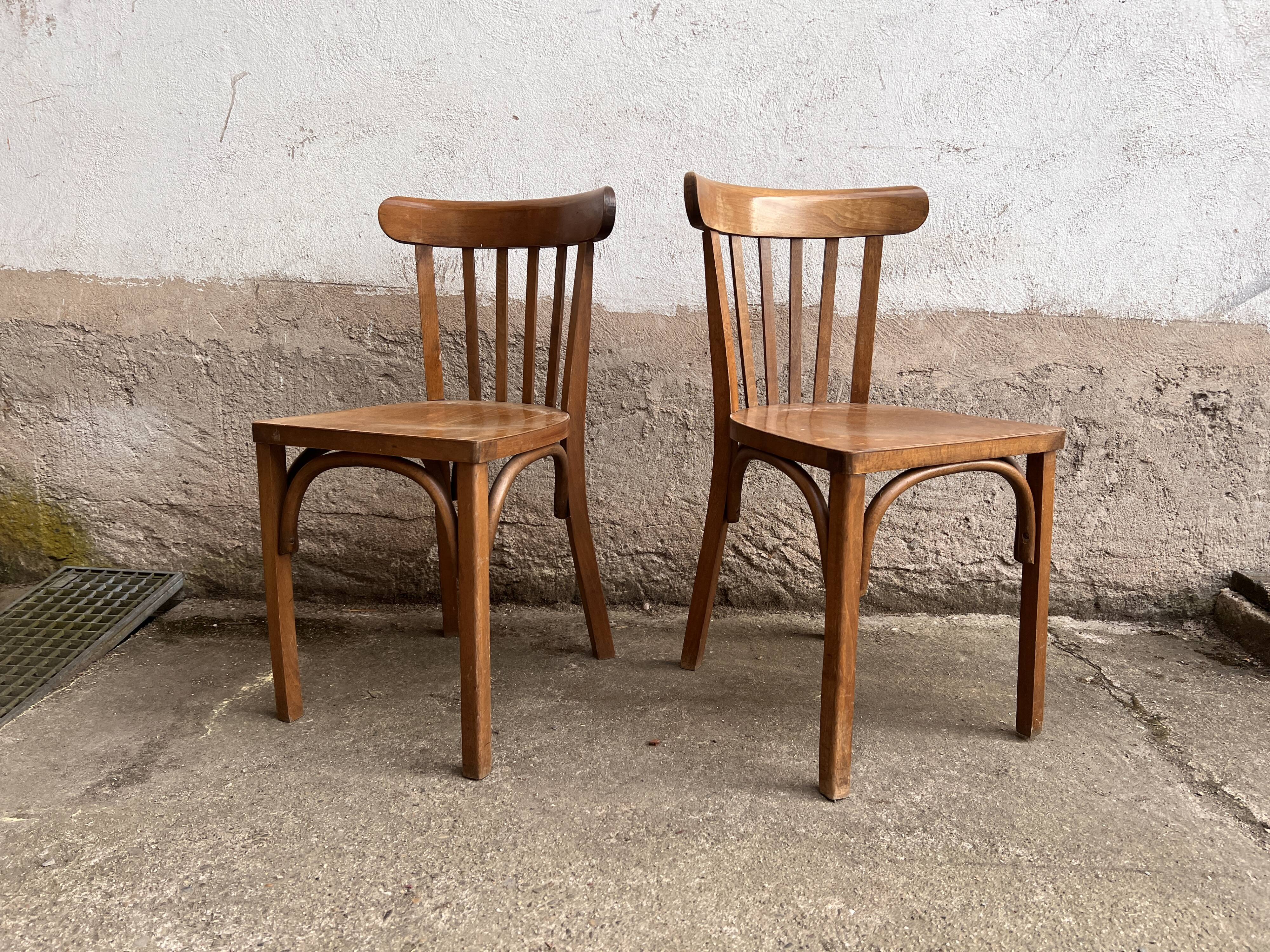 Pair of vintage wooden bistro chairs