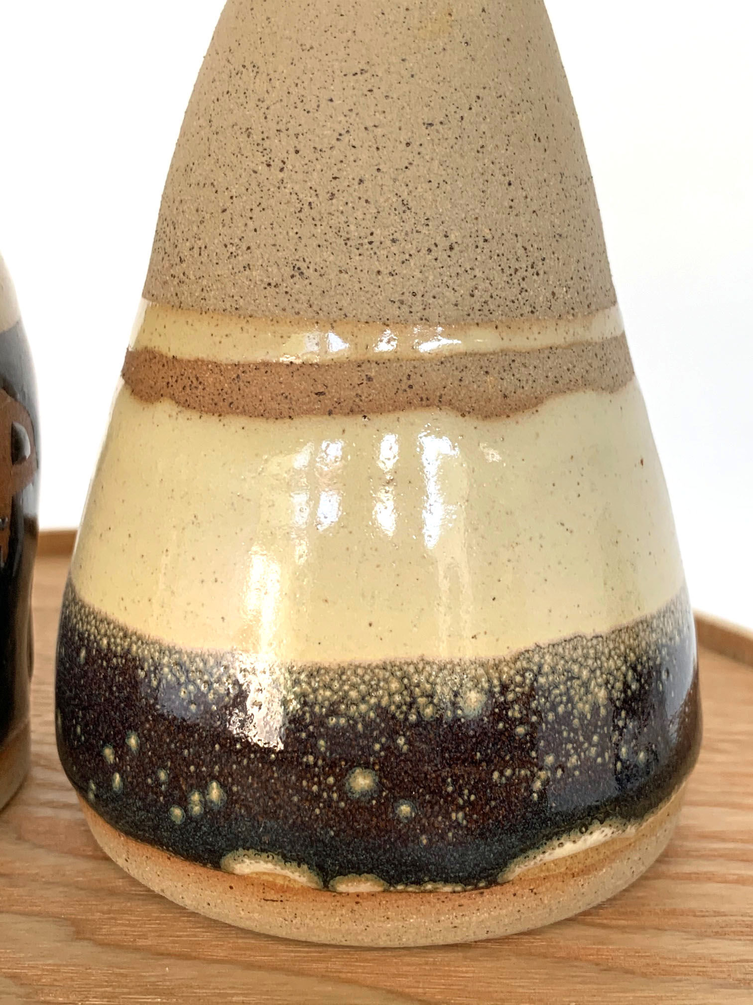 Artisanal sandstone form bottles