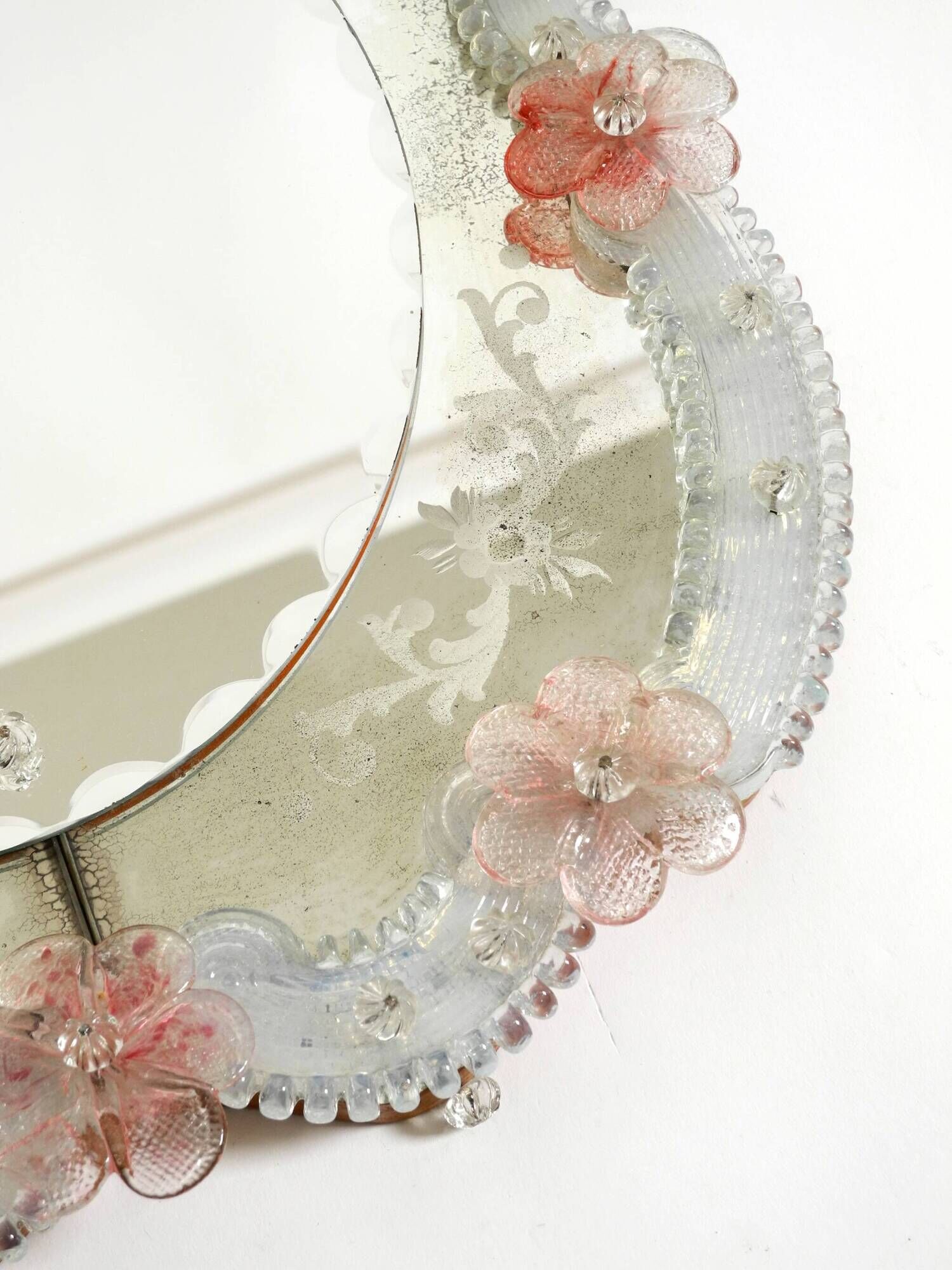 Italian mid-century wall mirror with a Murano glass frame and blossoms