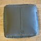 Grey leather pouf