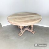 Oval solid walnut dining table on central leg with 4 extensions, 12/15 people